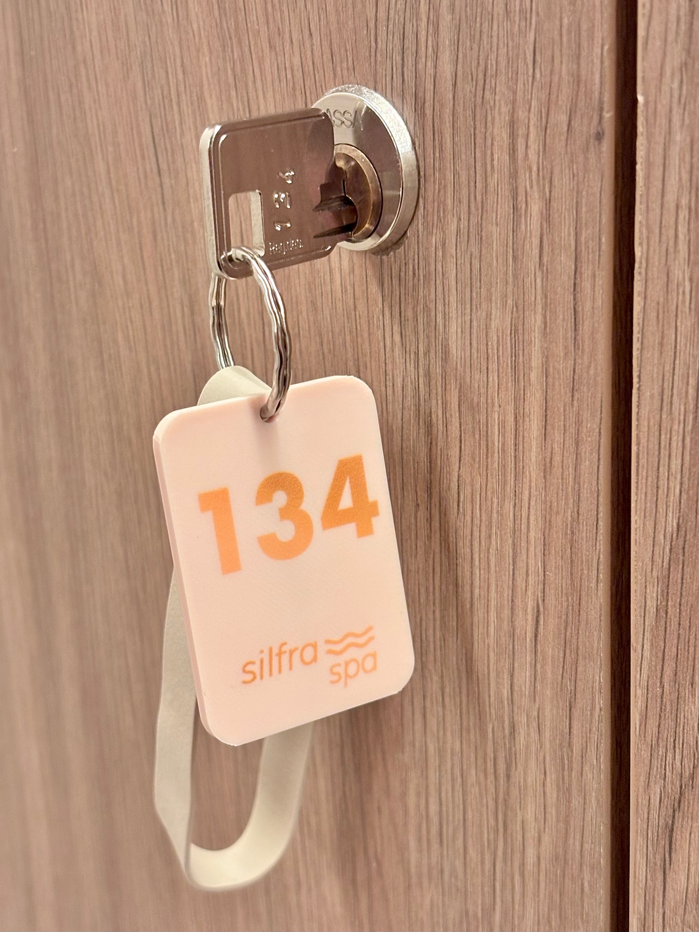 Silfra Spa NFC keychain on locker room door, number 134